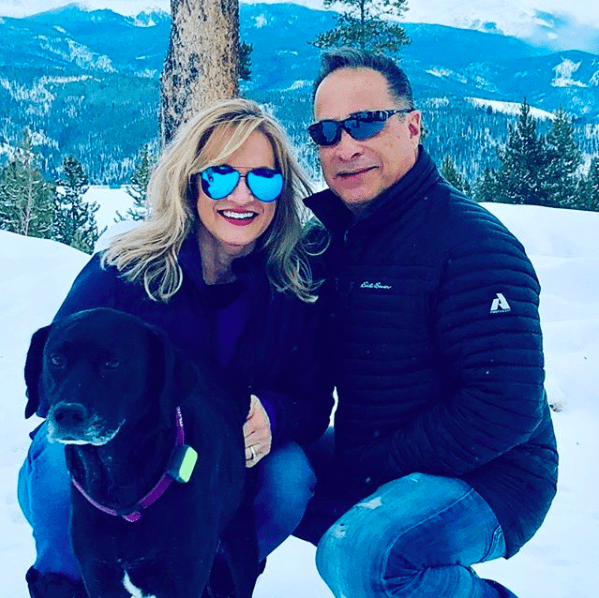 dog with pet parent in snow